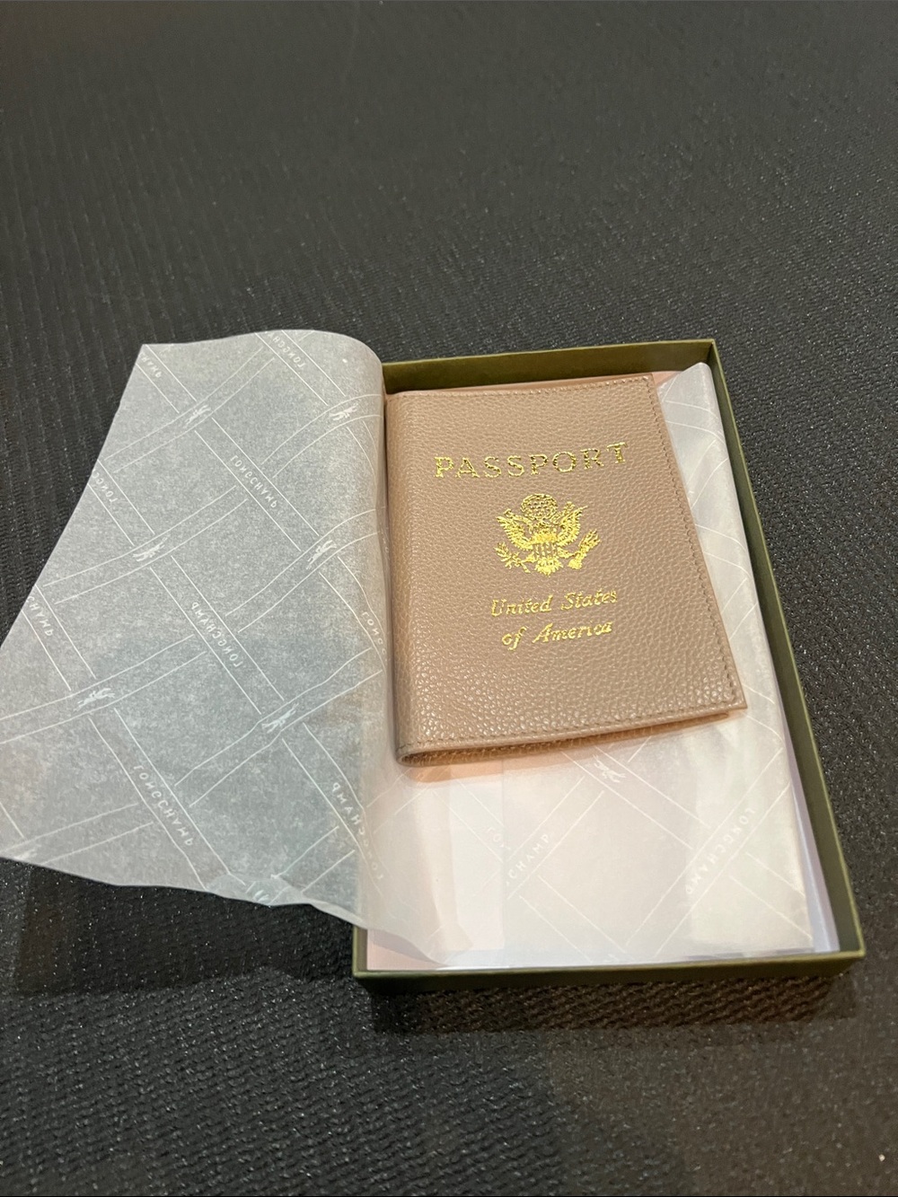 Longchamp Blush Brown Pebbled Leather Passport Cover with Gold Foil